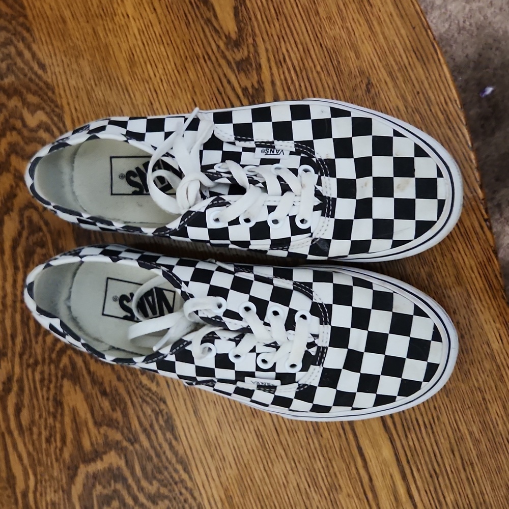 White and black checkered Vans